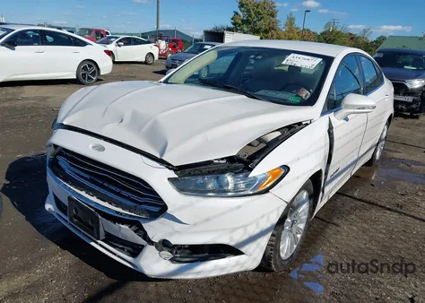 2014 Ford Fusion Hybrid Se z USA, uszkodzony, nr VIN 3FA6P0LU9ER252475